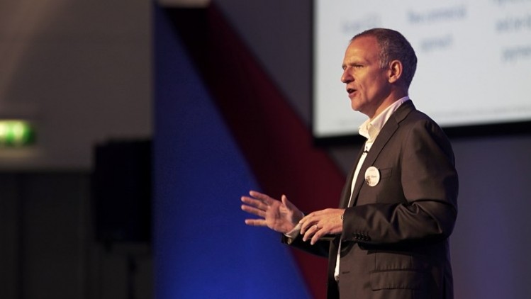 Tesco boss Dave Lewis urged businesses to reduce food waste